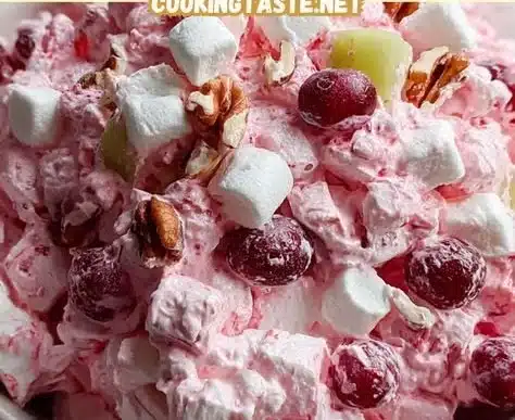 Creamy and colorful Cranberry Fluff dessert served in a bowl.