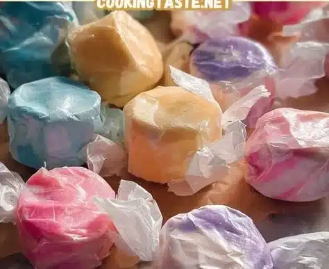 Homemade Saltwater Taffy 6 Bowl of colorful homemade saltwater taffy candies on a wooden table