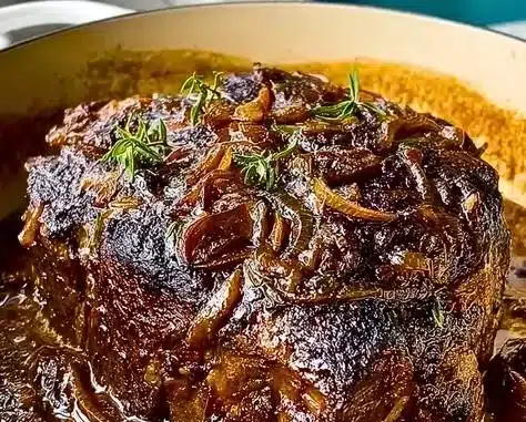 Caramelized French Onion Pot Roast 4 Caramelized French Onion Pot Roast served with herbs and vegetables