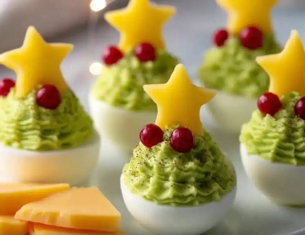 Festive Avocado Deviled Eggs for Holiday Appetizers 2 Festive avocado deviled eggs served on a platter for holiday appetizers