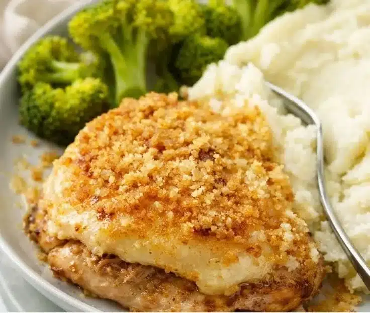 Delicious Longhorn Parmesan Crusted Chicken with golden crust and herbs