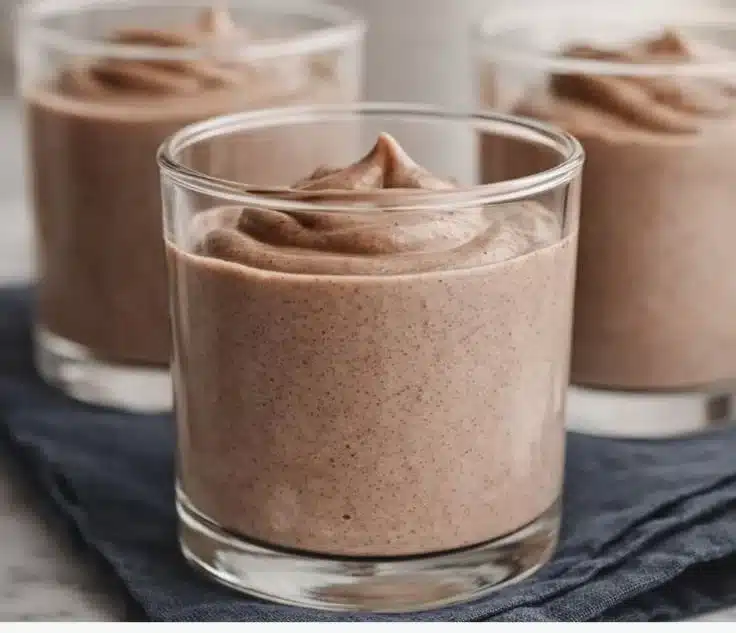 Delicious creamy chia seed pudding topped with fresh fruits and nuts.