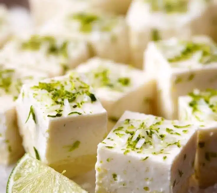 Delicious homemade Key Lime Fudge squares on a white plate