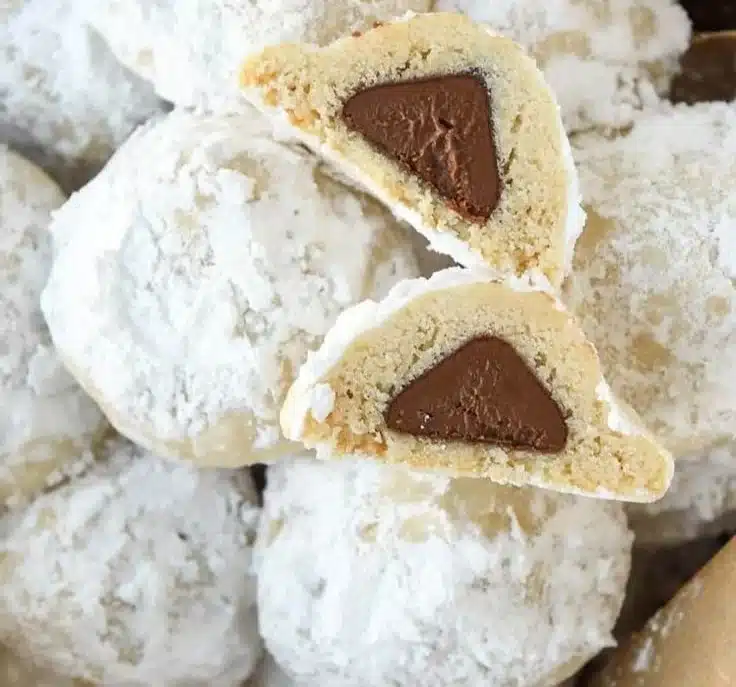 Snowball Kiss Cookies 6 Delicious Snowball Kiss Cookies topped with chocolate kisses and powdered sugar