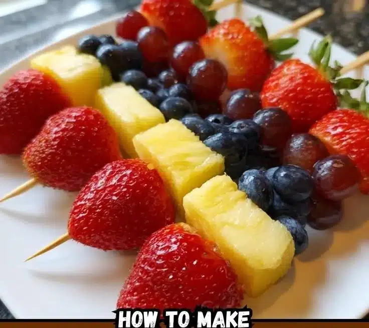 Valentine's Day fruit kabobs arranged beautifully on a serving platter