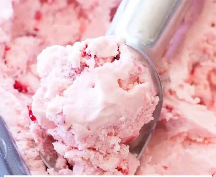 Bowl of homemade strawberry ice cream made with fresh strawberries