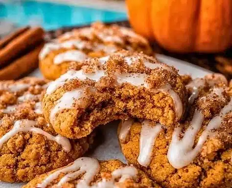Pumpkin Coffee Cake Cookies 2 Pumpkin coffee cake cookies fresh out of the oven on a cooling rack.